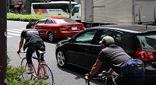 Bicycles share the road with cars.